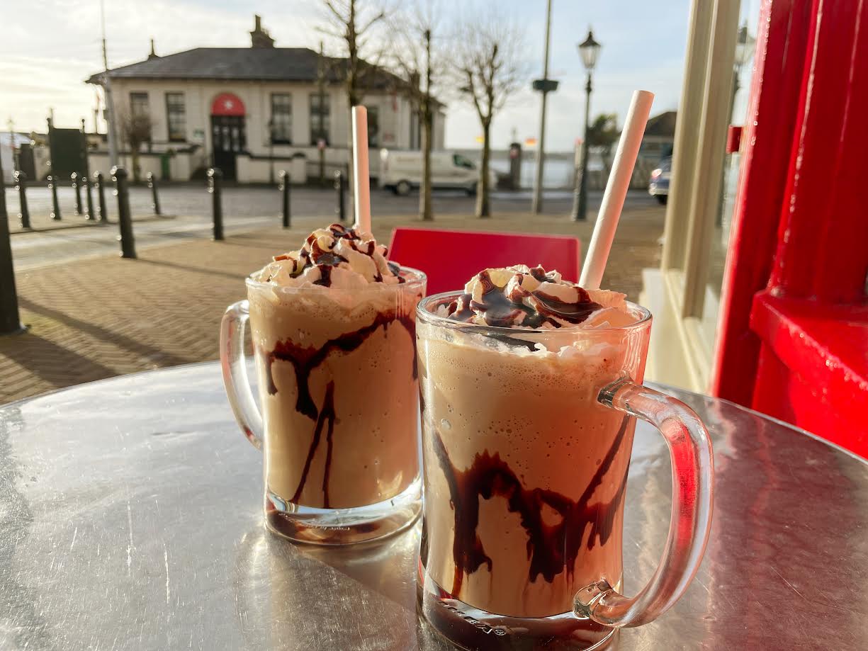 Iced coffees outside Ménara Café, Longford town in the background